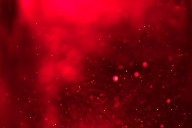 Işıklandırıcı duvar kâğıdının arka planında kırmızı ışık yansıması var. Kart, reklam, broşür vs. için ideal., 