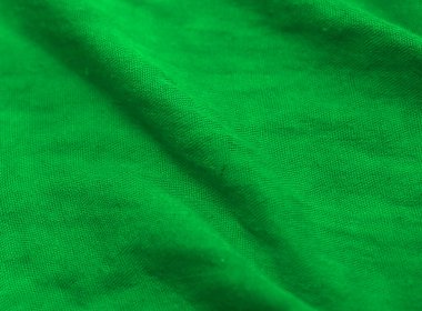 Soyut yeşil tekstil kumaş dokusu arka planı. Noel duvar kâğıdı. Boşluğu Kopyala. 