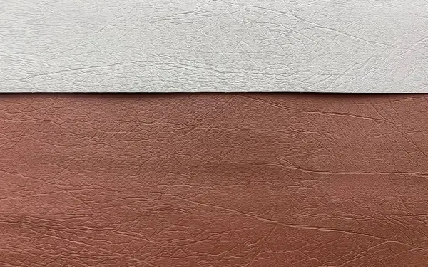 Kahverengi gri deri yüzey arkaplanının soyut dokusu
