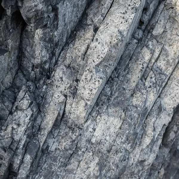 stock image Rock surface with rough textures background.