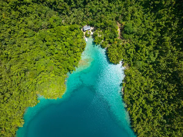 stock image Top down view of Turquoise water and Rainforest of Tropical Island. Bucas Grande Island. Mindanao, Philippines.