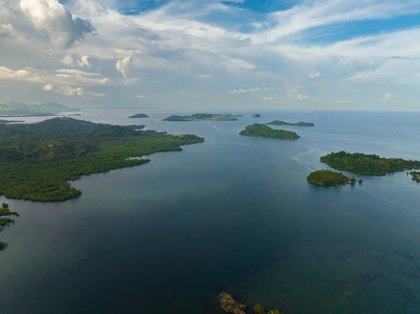 stock image Drone view of cluster of islands and islets of Once Islas. Blue sea with blue sky and clouds. Zamboanga. Mindanao, Philippines.