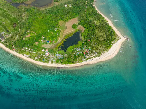 stock image Turquoise sea water with corals and sandy beach in Santa Fe, Tablas, Romblon. Philippines.