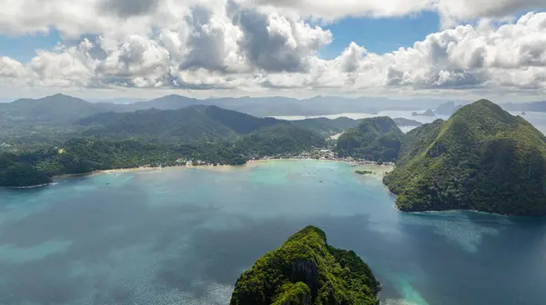 stock image Top view of coastal town with boats floating over turquoise water. El Nido, Palawan. Philippines.