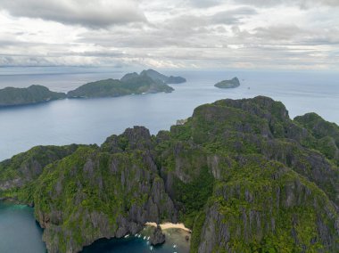 Aerial view of Lagoon and White Sand Beach in Miniloc Island, El Nido, Philippines. clipart