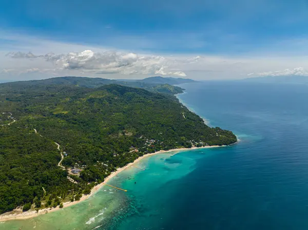 stock image Tropical beach with white sand and trees. Transparent azure water and corals. Samal Island. Davao, Philippines.