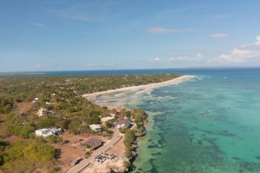 Tropical landscape of The Ruins and cliffs at coastline in Bantayan Island. Cebu, Philippines. clipart