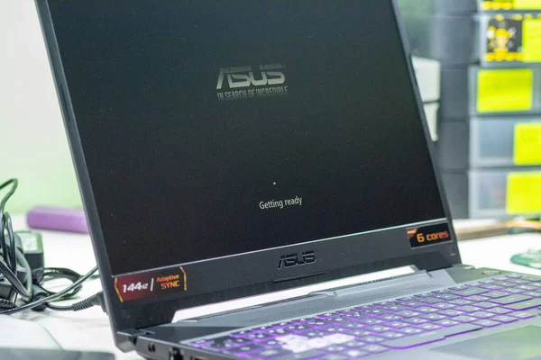 computer keyboard with a laptop and a hat