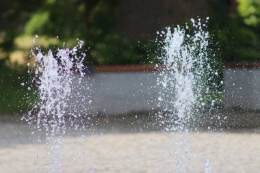 City fountain on a summer sunny day