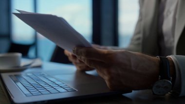 Businessman hands using computer touchpad in ocean view office. Unknown expert reading documents at luxury workplace. Manager checking report at panorama window place. Leader boss at luxury work 