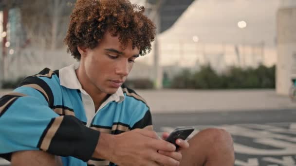 Focused Hipster Texting Smartphone Evening City Closeup Stylish Student Sitting — Video