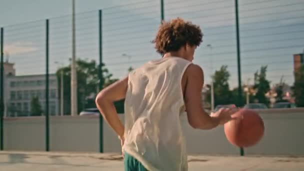 Teenager Throwing Ball Basket Back View Modern Sportsman Playing Urban — Stock Video