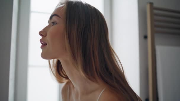 Smiling Lady Looking Mirror Bathroom Closeup Stunning Woman Tucks Hair — Stock video
