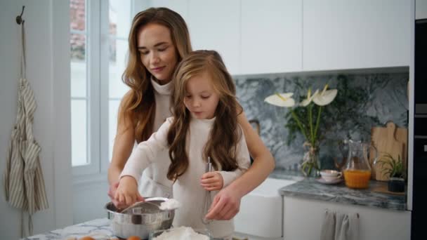 Adorable Child Helping Mom Kitchen Close Positive Family Having Fun — Stock video