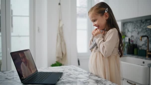 Lovely Child Waving Laptop Kitchen Close Joyful Daughter Bonding Bunny — Stockvideo