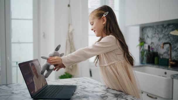 Cute Baby Showing Toy Laptop Screen Cozy Home Closeup Positive — Vídeo de stock