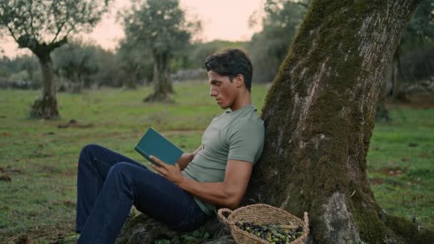 Interested Gardener Reading Storybook Evening Nature Closeup Calm Man Holding — Stock Video