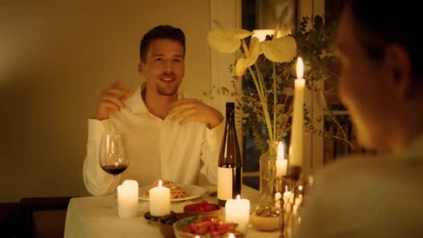 Cheerful Man Talking Candles Dinner Close Brunette Guy Speaking Romantic — Stockvideo