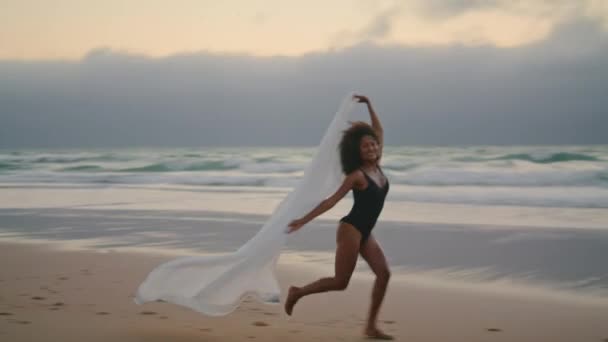 Attractive Energetic Girl Running Beach White Pareo Swaying Summer Wind — Stockvideo