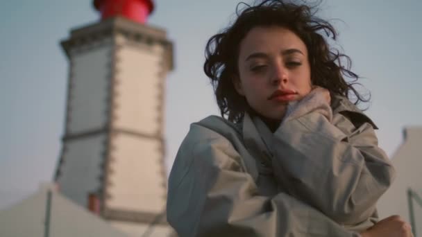 Closeup Woman Posing Seaside Lighthouse Lonely Pensive Girl Looking Camera — Vídeo de Stock