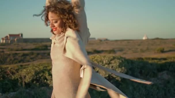 Beautiful Girl Spinning Sunlight Walking Ocean Cliff Carefree Woman Enjoy — Vídeos de Stock