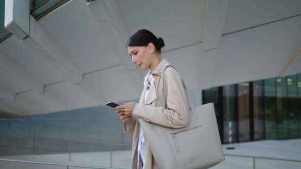 Serious Young Businesswoman Messaging Smartphone Wearing Elegant Coat Worried Attractive — Stockvideo