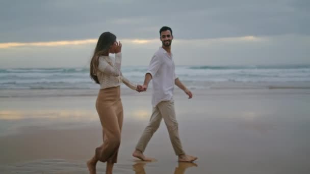 Young Spouses Relaxing Beach Evening Happy Lovers Holding Hands Walking — Stock Video