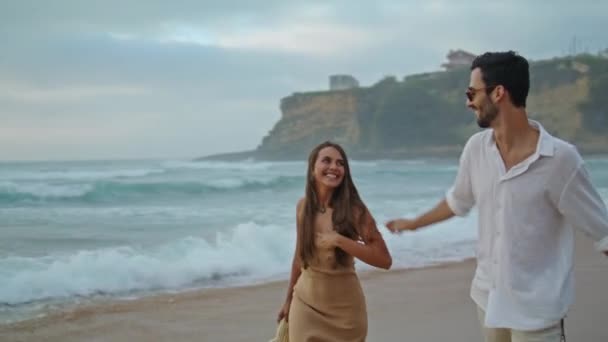 Playful Pair Rejoicing Ocean Closeup Positive Lovers Holding Hands Evening — Stock video