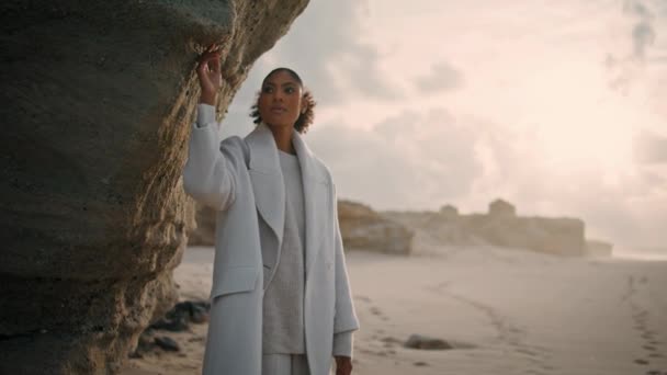 Beautiful Girl Touching Cliff Wall Empty Beach Serene African American — Stockvideo