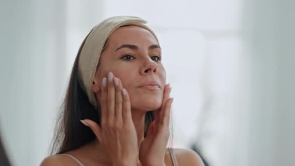 Happy Lady Applying Cream Looking Mirror Home Closeup Hair Bandage — Stock Video