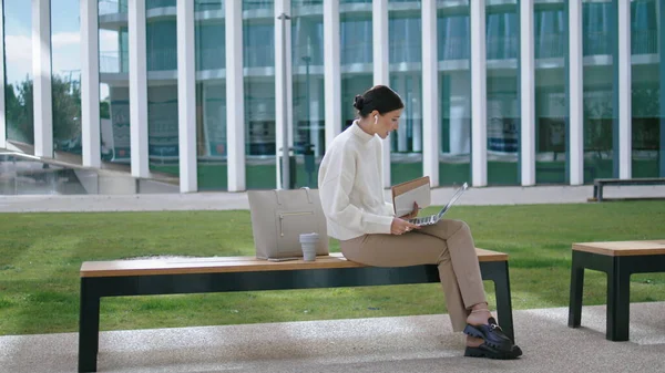 Confident Successful Businesswoman Talking Video Chat Laptop Sitting Bench Outdoors — Stock Fotó