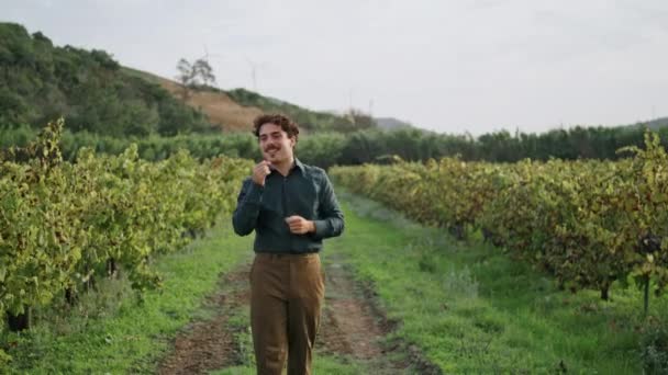 Happy Relaxed Farmer Inspecting Grape Plantation Walking Rural Road Grapevine — Stock Video