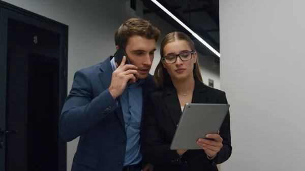 Company ceo calling investor checking corporate report in tablet. Office team go client meeting analysing stock market data. Confident lawyer talking mobile phone. Focused businesswoman hold computer
