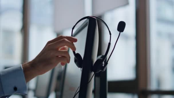 Closeup Hand Taking Headset Call Center Technical Support Equipment Hanging — Stock Video