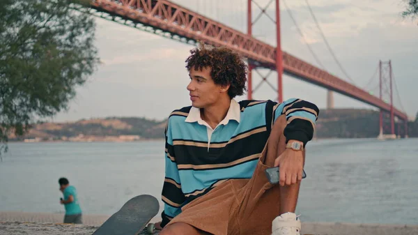 Travel Guy Resting Embankment Lisbon Zoom Curly Hair Teen Looking — Stockfoto