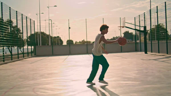 Involved Teenager Bounce Ball Stadium Basketball Player Making Basket Throw — Stockfoto