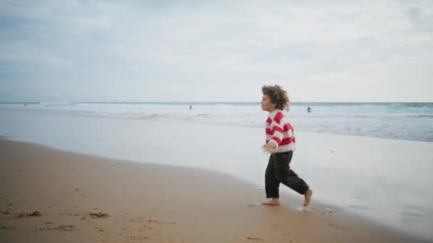 Happy Boy Running Ocean Shore Barefoot Cheerful Son Playing Airplane — Stock Video