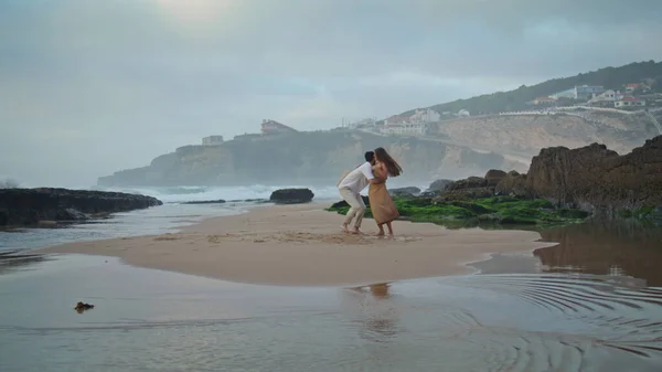 Unknown Newlyweds Spinning Sea Beach Vacation Together Joyful Couple Showing — Φωτογραφία Αρχείου