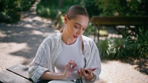Relaxed Girl Scrolling Smartphone Searching Information Online Sitting Park Table — Stock Video