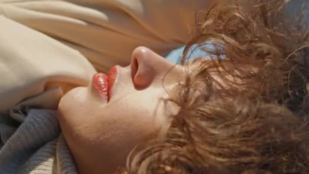 Girl Closing Eyes Sunlight Vertical Closeup Serene Woman Touching Curly — Stock Video