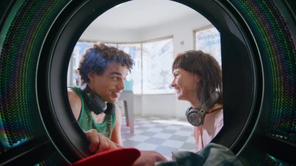 Laundry Girl Talking Guy Self Service Closeup Joyful Teen Couple — Stock Video
