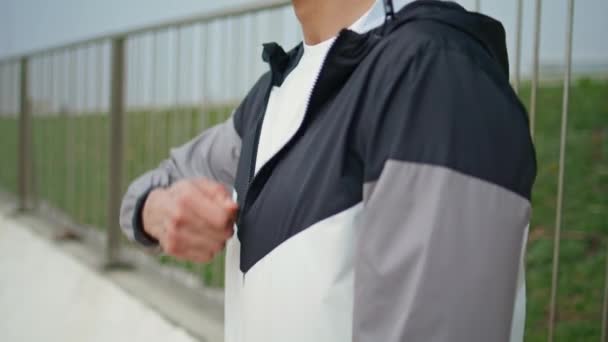 Hand Zipping Sport Jacket Street Closeup Fitness Man Training Morning — Stock Video