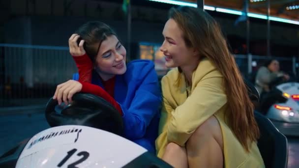 Two Best Friends Looking Camera Hugging Funfair Closeup Smiling Girls — Stock Video