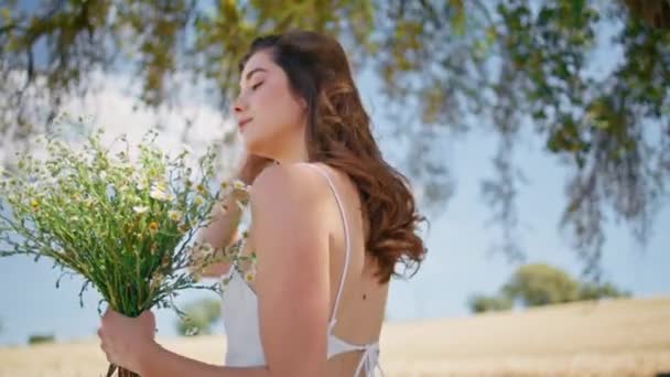 Young Lady Inhaling Daisies Fragrance Summer Countryside Closeup Relaxed Brunette — Stock Video