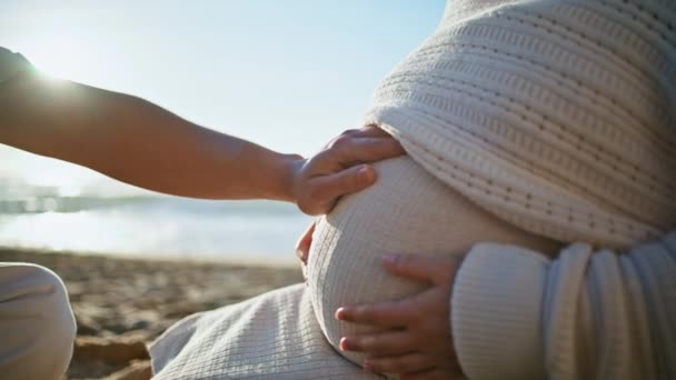 Man Hand Touching Pregnant Belly Beloved Wife Sitting Sand Beach — Stock Video