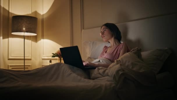 Chill Woman Browsing Laptop Night Cheerful Freelancer Working Late Bed — Stock Video