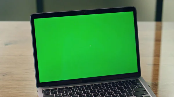 Lady using greenscreen laptop in office close up. Anonymous business woman working chroma computer zoom out. Female director preparing conference touching mockup display device. Technologies concept