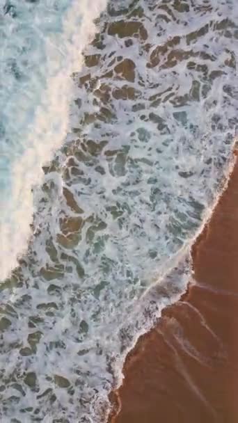 Foamy Ocean Washing Sand Vertically Closeup Aerial Turquoise Water Rolling — Stock Video