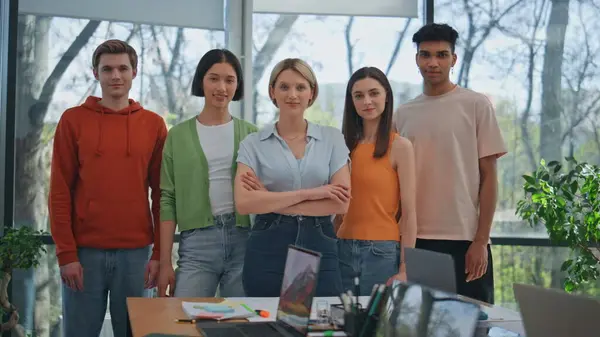 stock image Portrait happy corporate team at cabinet. Smiling diverse startupers looking camera standing in row at modern office. Proud business people group making joint photo together. Confident colleagues 