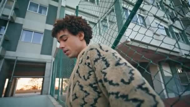 Serious Guy Leaning Urban Fence Closeup Metropolitan Man Standing Quiet — Stock Video